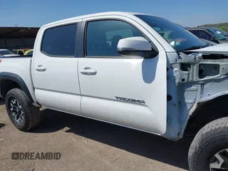 2023 Toyota Tacoma SR z VIN 3TYCZ5AN5PT151681, wystawiony jako IAAI lot #41936577 z przebiegiem 30 056 mil mil oraz . Historia ofert i sprzedaży dostępna na DreamBid. Obrazek 14.