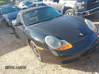 1999 Porsche Boxster with VIN WP0CA2983XU631827, listed as a IAAI auction lot 42554867 with Not provided miles and . Bid and sale history available at DreamBid. Image 1.