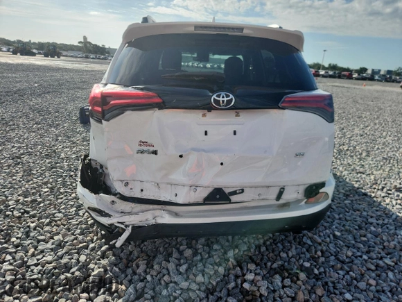 2016 Toyota RAV4 SE z VIN JTMNFREVXGD080908, wystawiony jako Copart lot #60791155 z przebiegiem 87 368 mil mil oraz Szkoda całkowita • Salvage title. Historia ofert i sprzedaży dostępna na DreamBid. Obrazek 6.
