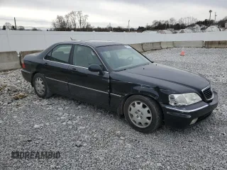 2004 Acura RL w/Navigation System z VIN JH4KA96664C007799, wystawiony jako Copart lot #44207245 z przebiegiem 215 098 mil mil oraz Szkoda całkowita • Salvage title. Historia ofert i sprzedaży dostępna na DreamBid. Obrazek 4.