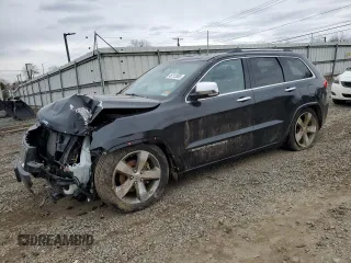 2015 Jeep Grand Cherokee Overland with VIN 1C4RJFCG2FC912328, listed as a Copart auction lot 46112005 with 170,366 mi miles and Salvage Title. Bid and sale history available at carsss.com. Image 1.