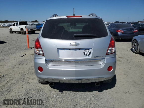 2012 Chevrolet Captiva Sport LTZ with VIN 3GNFL4E54CS642304, listed as a Copart auction lot 72623484 with 114,554 mi miles and Salvage Title. Bid and sale history available at DreamBid. Image 6.