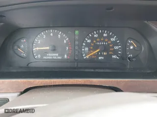 1997 Toyota Avalon XL with VIN 4T1BF12B5VU185685, listed as a IAAI auction lot 42037605 with 150,999 mi miles. Bid and sale history available at carsss.com. Image 7.