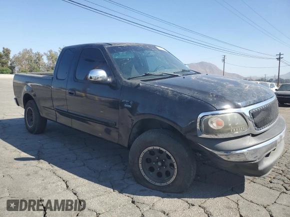 2000 Ford F-150 XL with VIN 1FTRX17W7YKB44552, listed as a Copart auction lot 72790504 with 0 mi miles and Salvage Title. Bid and sale history available at carsss.com. Image 4.