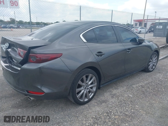 2021 Mazda 3 Select with VIN 3MZBPABL5MM252201, listed as a IAAI auction lot 42029577 with Not Provided miles and . Bid and sale history available at DreamBid. Image 4.