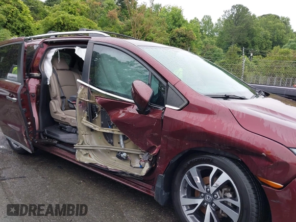 2021 Honda Odyssey Touring with VIN 5FNRL6H88MB006938, listed as a IAAI auction lot 42367022 with 63,280 mi miles and . Bid and sale history available at DreamBid. Image 12.