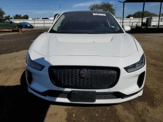 2019 Jaguar I-Pace SE z VIN SADHC2S19K1F68022, wystawiony jako Copart lot #77405114 z przebiegiem Nie podano mil oraz Szkoda całkowita • Salvage title. Historia ofert i sprzedaży dostępna na DreamBid. Obrazek 5.