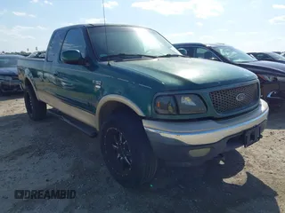 2000 Ford F-150 XL z VIN 1FTRX18L6YNA99929, wystawiony jako IAAI lot #42073679 z przebiegiem Nie podano mil oraz . Historia ofert i sprzedaży dostępna na DreamBid. Obrazek 1.