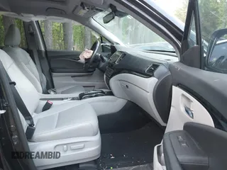 2019 Honda Pilot Touring 7-Passenger with VIN 5FNYF6H60KB030990, listed as a IAAI auction lot 42160762 with 68,807 mi miles and . Bid and sale history available at DreamBid. Image 5.
