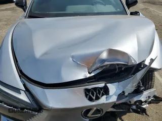 2025 Lexus RZ 300e Premium z VIN JTJABABB3SA007988, wystawiony jako Copart lot #54241965 z przebiegiem 2 633 mil mil oraz Szkoda całkowita • Salvage title. Historia ofert i sprzedaży dostępna na DreamBid. Obrazek 12.