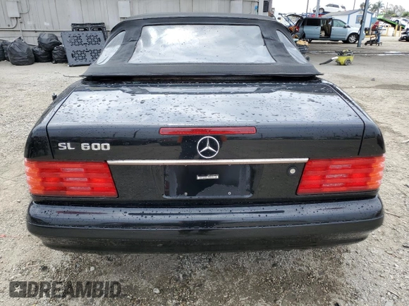 1998 Mercedes-Benz SL z VIN WDBFA76F6WF165874, wystawiony jako Copart lot #53392195 z przebiegiem 141 126 mil mil oraz Tytuł czysty. Historia ofert i sprzedaży dostępna na DreamBid. Obrazek 6.