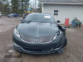 2015 Lincoln MKZ z VIN 3LN6L2J90FR616800, wystawiony jako IAAI lot #41683401 z przebiegiem 92 239 mil mil oraz . Historia ofert i sprzedaży dostępna na DreamBid. Obrazek 12.