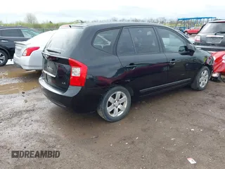 2008 Kia Rondo EX with VIN KNAFG525287175488, listed as a IAAI auction lot 41941146 with 162,000 mi miles. Bid and sale history available at carsss.com. Image 4.