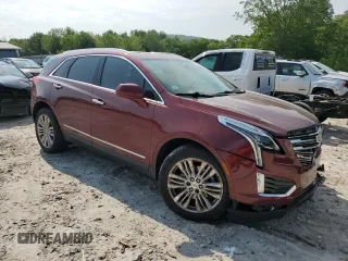 2017 Cadillac XT5 Premium Luxury AWD with VIN 1GYKNERS1HZ112898, listed as a Copart auction lot 58984795 with 140,803 mi miles and Salvage title. Bid and sale history available at DreamBid. Image 4.