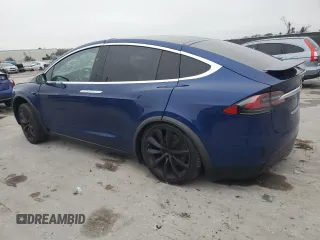 2020 Tesla Model X Long Range with VIN 5YJXCBE2XLF250234, listed as a Copart auction lot 42236365 with 63,401 mi miles and Non Repairable. Bid and sale history available at carsss.com. Image 2.