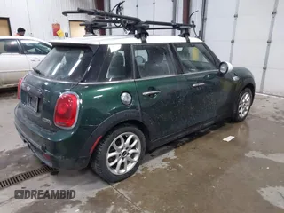 2015 MINI Hardtop 4 Door S z VIN WMWXU3C55FT892293, wystawiony jako IAAI lot #41359066 z przebiegiem 112 704 mil mil oraz . Historia ofert i sprzedaży dostępna na DreamBid. Obrazek 4.