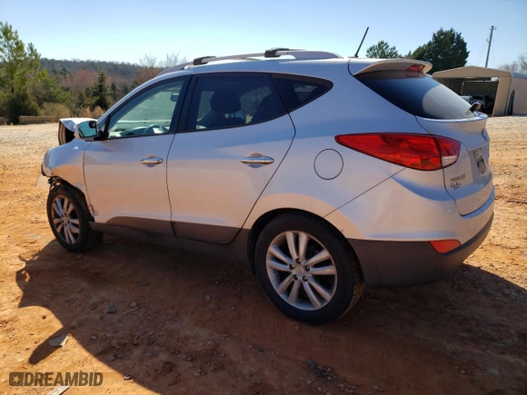 2012 Hyundai Tucson Limited with VIN KM8JU3AC4CU443716, listed as a Copart auction lot 47302015 with 167,437 mi miles and Salvage Title. Bid and sale history available at carsss.com. Image 2.