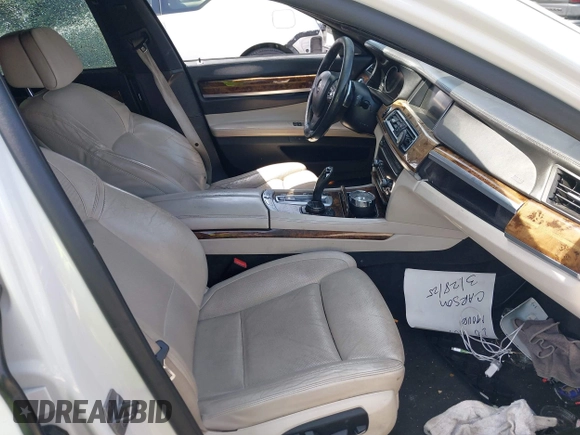 2014 BMW 7 Series ALPINA B7 with VIN WBAYE8C59ED135260, listed as a IAAI auction lot 41906238 with 152,030 mi miles. Bid and sale history available at carsss.com. Image 5.