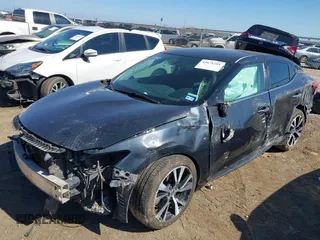 2016 Nissan Maxima SV with VIN 1N4AA6AP4GC378580, listed as a IAAI auction lot 41671281 with 122,866 mi miles and . Bid and sale history available at DreamBid. Image 18.