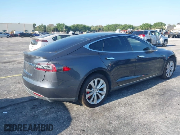 2015 Tesla Model S 85D with VIN 5YJSA1H46FF082264, listed as a IAAI auction lot 42068959 with 98,693 mi miles. Bid and sale history available at carsss.com. Image 4.