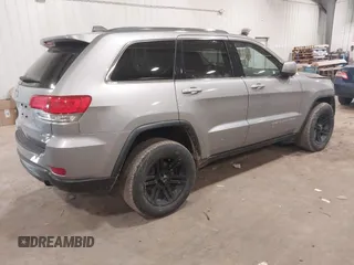 2015 Jeep Grand Cherokee Laredo with VIN 1C4RJFAG4FC797069, listed as a IAAI auction lot 41435299 with 146,755 mi miles. Bid and sale history available at carsss.com. Image 4.