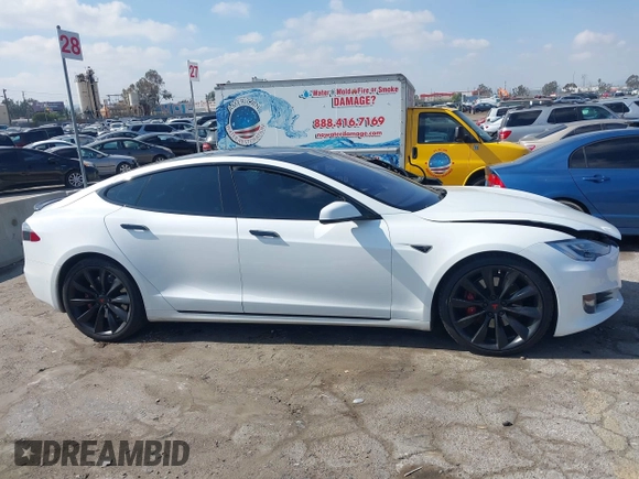 2016 Tesla Model S 90D with VIN 5YJSA1E27GF153525, listed as a IAAI auction lot 41539221 with 145,771 mi miles and . Bid and sale history available at DreamBid. Image 13.