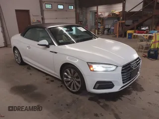 2018 Audi A5 Cabriolet Premium z VIN WAUWNGF56JN003624, wystawiony jako IAAI lot #42289519 z przebiegiem 62 596 mil mil oraz . Historia ofert i sprzedaży dostępna na DreamBid. Obrazek 1.