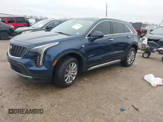 2019 Cadillac XT4 FWD Premium Luxury with VIN 1GYFZCR46KF171126, listed as a IAAI auction lot 41557387 with 88,811 mi miles. Bid and sale history available at carsss.com. Image 2.