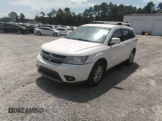 2017 Dodge Journey SXT z VIN 3C4PDCBG3HT537331, wystawiony jako IAAI lot #42694213 z przebiegiem 193 609 mil mil oraz . Historia ofert i sprzedaży dostępna na DreamBid. Obrazek 2.