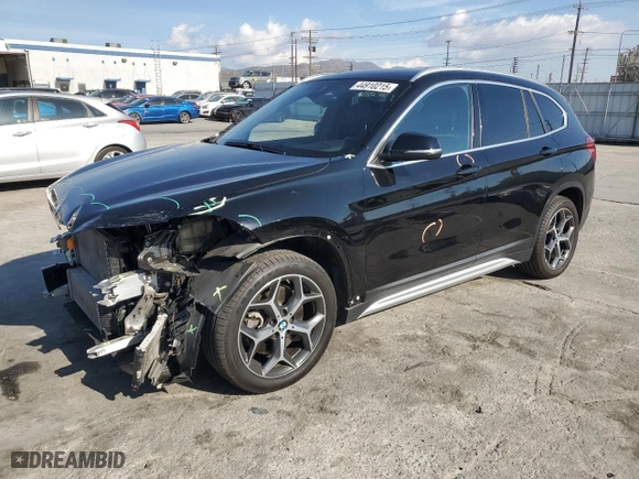 2019 BMW X1 sDrive28i with VIN WBXHU7C59K5N01520, listed as a Copart auction lot 44910215 with 44,239 mi miles and Salvage Title. Bid and sale history available at carsss.com. Image 1.