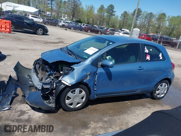 2010 Toyota Yaris with VIN JTDJT4K36A5285298, listed as a IAAI auction lot 42003609 with 158,418 mi miles. Bid and sale history available at carsss.com. Image 14.