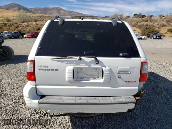 2001 Isuzu Rodeo S with VIN 4S2DM58W614343261, listed as a Copart auction lot 75365974 with Not Provided miles and Clean Title. Bid and sale history available at DreamBid. Image 6.