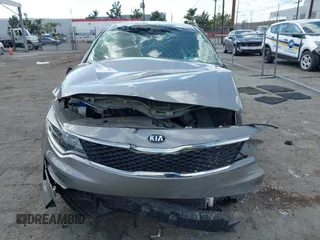 2018 Kia Optima LX z VIN 5XXGT4L38JG228380, wystawiony jako IAAI lot #41960308 z przebiegiem 43 317 mil mil oraz . Historia ofert i sprzedaży dostępna na DreamBid. Obrazek 6.