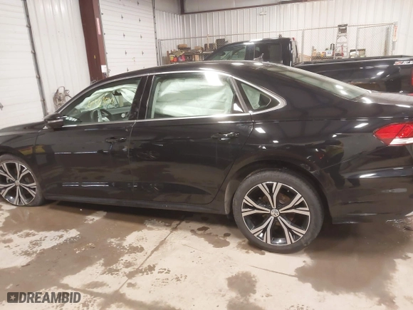 2021 Volkswagen Passat 2.0T SE with VIN 1VWSA7A30MC010553, listed as a IAAI auction lot 41581624 with 26,320 mi miles. Bid and sale history available at carsss.com. Image 14.