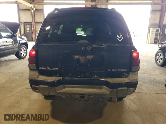 2004 Chevrolet TrailBlazer EXT LT with VIN 1GNET16P146199867, listed as a Copart auction lot 61944124 with 219,727 mi miles and Salvage Title. Bid and sale history available at carsss.com. Image 6.