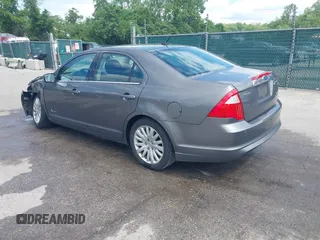 2011 Ford Fusion Hybrid with VIN 3FADP0L32BR132155, listed as a IAAI auction lot 42196233 with 77,900 mi miles and . Bid and sale history available at DreamBid. Image 3.