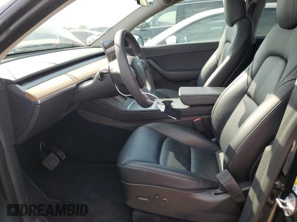 2022 Tesla Model Y Long Range with VIN 7SAYGAEE1NF381491, listed as a Copart auction lot 52694185 with 33,412 mi miles and Salvage Title. Bid and sale history available at DreamBid. Image 7.