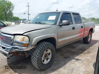 2003 GMC Sierra 1500HD SLT z VIN 1GTGK13U93F108499, wystawiony jako IAAI lot #42149012 z przebiegiem 296 775 mil mil oraz . Historia ofert i sprzedaży dostępna na DreamBid. Obrazek 2.
