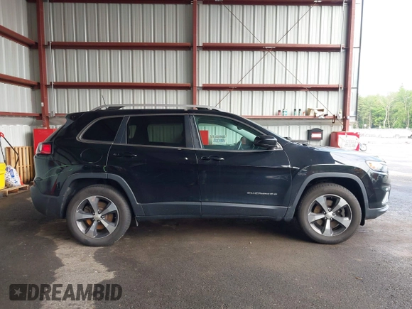 2019 Jeep Cherokee Limited with VIN 1C4PJMDX7KD137829, listed as a IAAI auction lot 42437417 with 143,214 mi miles and . Bid and sale history available at DreamBid. Image 13.