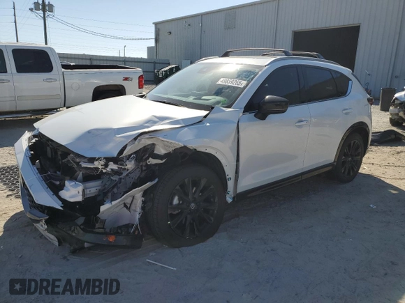 2024 Mazda CX-5 2.5 Carbon Turbo with VIN JM3KFBAY5R0473887, listed as a Copart auction lot 49859265 with 9,220 mi miles and Salvage Title. Bid and sale history available at carsss.com. Image 1.