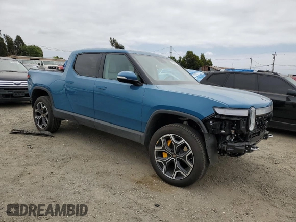2023 Rivian R1T Launch Edition with VIN 7FCTGAAL7PN019188, listed as a Copart auction lot 55100405 with 13,654 mi miles and Salvage Title. Bid and sale history available at DreamBid. Image 4.