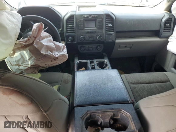 2018 Ford F-150 XL with VIN 1FTEW1E59JFE10695, listed as a Copart auction lot 60171325 with 134,904 mi miles and Salvage title. Bid and sale history available at DreamBid. Image 8.