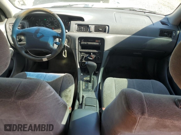 1997 Toyota Camry LE z VIN JT2BG22K4V0077954, wystawiony jako Copart lot #57682355 z przebiegiem 254 596 mil mil oraz Szkoda całkowita • Salvage title. Historia ofert i sprzedaży dostępna na DreamBid. Obrazek 8.