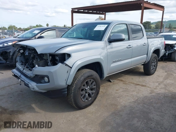 2020 Toyota Tacoma SR5 with VIN 5TFAZ5CN6LX089275, listed as a IAAI auction lot 41987526 with 51,661 mi miles and . Bid and sale history available at DreamBid. Image 18.