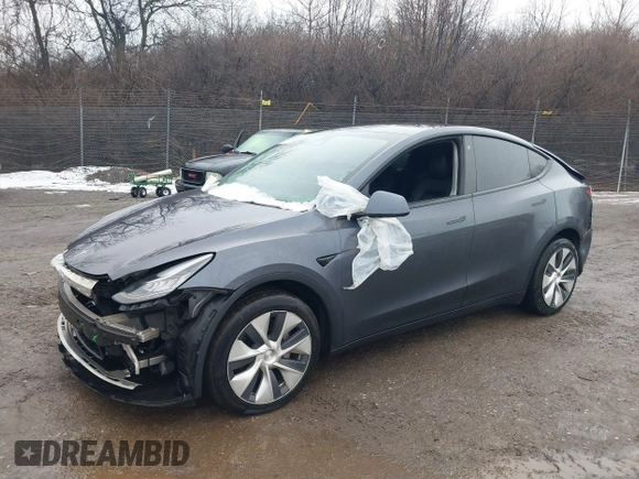 2022 Tesla Model Y Long Range z VIN 7SAYGDEE9NF331410, wystawiony jako IAAI lot #41580172 z przebiegiem 81 794 mil mil oraz . Historia ofert i sprzedaży dostępna na DreamBid. Obrazek 19.