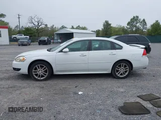 2013 Chevrolet Impala LTZ with VIN 2G1WC5E39D1202260, listed as a IAAI auction lot 41908155 with 210,193 mi miles and . Bid and sale history available at DreamBid. Image 14.