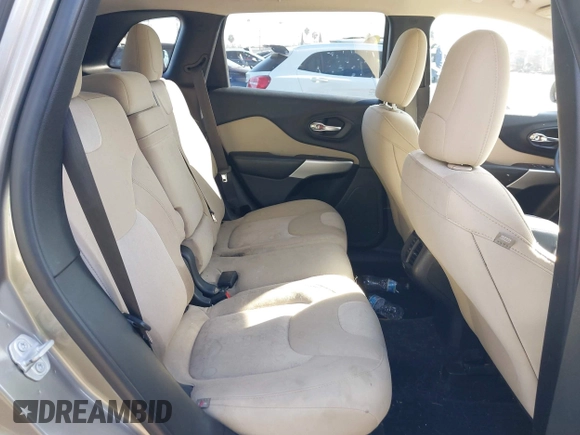 2017 Jeep Cherokee Altitude with VIN 1C4PJLAS7HW617482, listed as a IAAI auction lot 41226235 with 64,708 mi miles and . Bid and sale history available at DreamBid. Image 8.