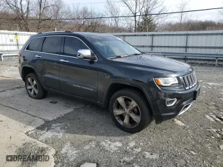 2014 Jeep Grand Cherokee Overland with VIN 1C4RJFCG4EC437649, listed as a Copart auction lot 45724965 with 161,052 mi miles and Clean Title. Bid and sale history available at carsss.com. Image 4.