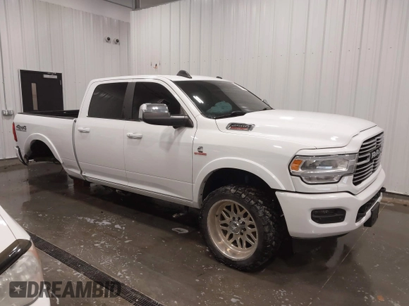 2019 Ram 2500 Laramie z VIN 3C6UR5FL7KG657180, wystawiony jako IAAI lot #41714476 z przebiegiem 97 334 mil mil oraz . Historia ofert i sprzedaży dostępna na DreamBid. Obrazek 1.