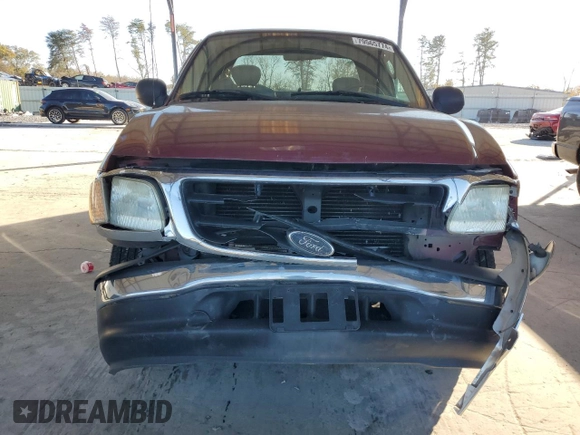 2003 Ford F-150 XL with VIN 1FTRX07L33KB73992, listed as a Copart auction lot 79565774 with 160,545 mi miles and Salvage title. Bid and sale history available at DreamBid. Image 5.